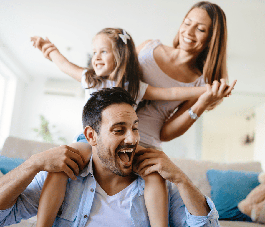 Happy family bonding at home in a managed HOA property