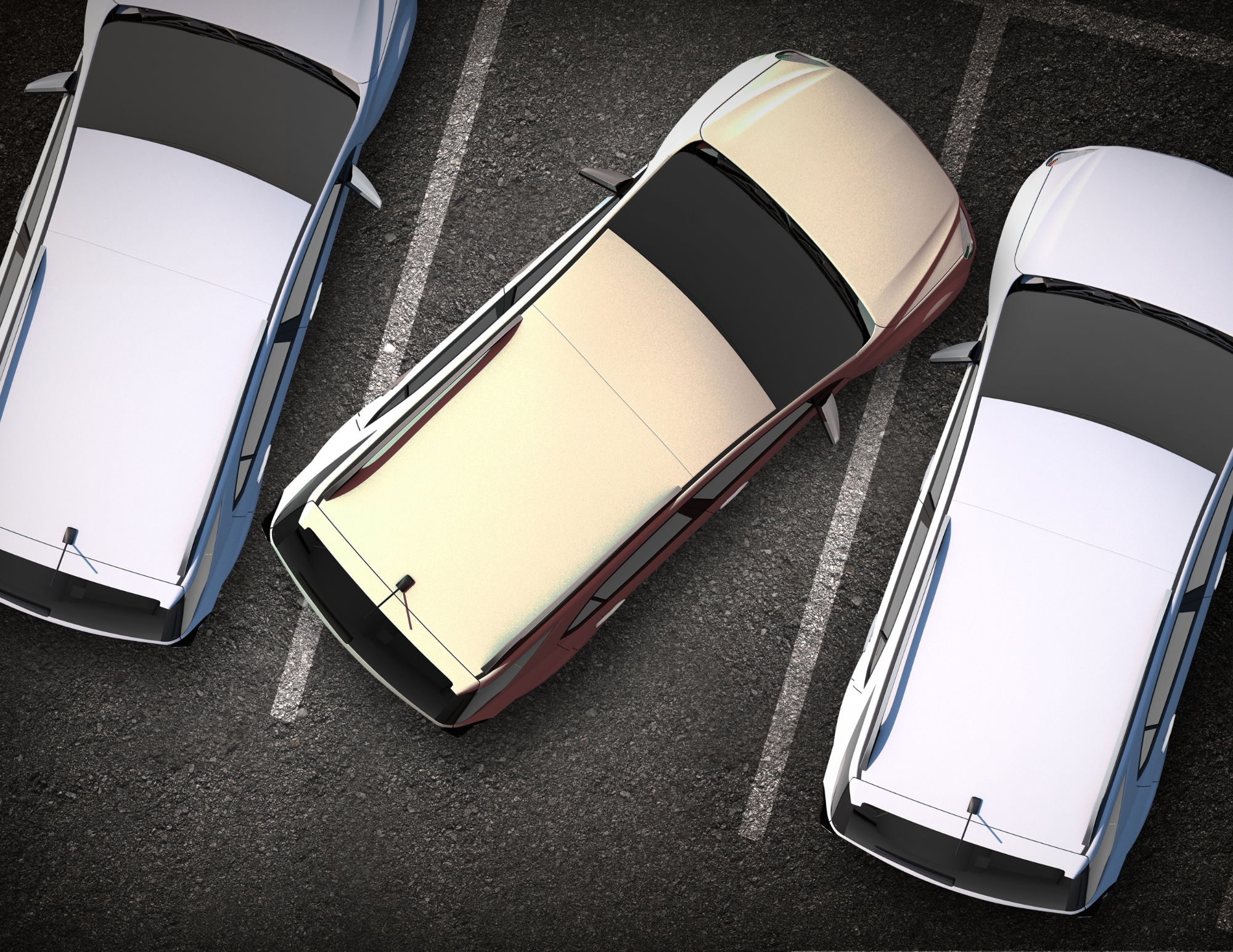 Overhead view of cars parked closely together in a parking lot.