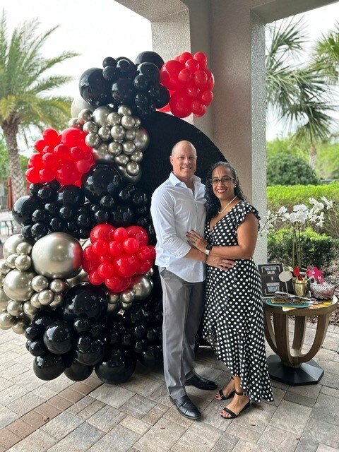 Couple enjoying a date night event at their community clubhouse.