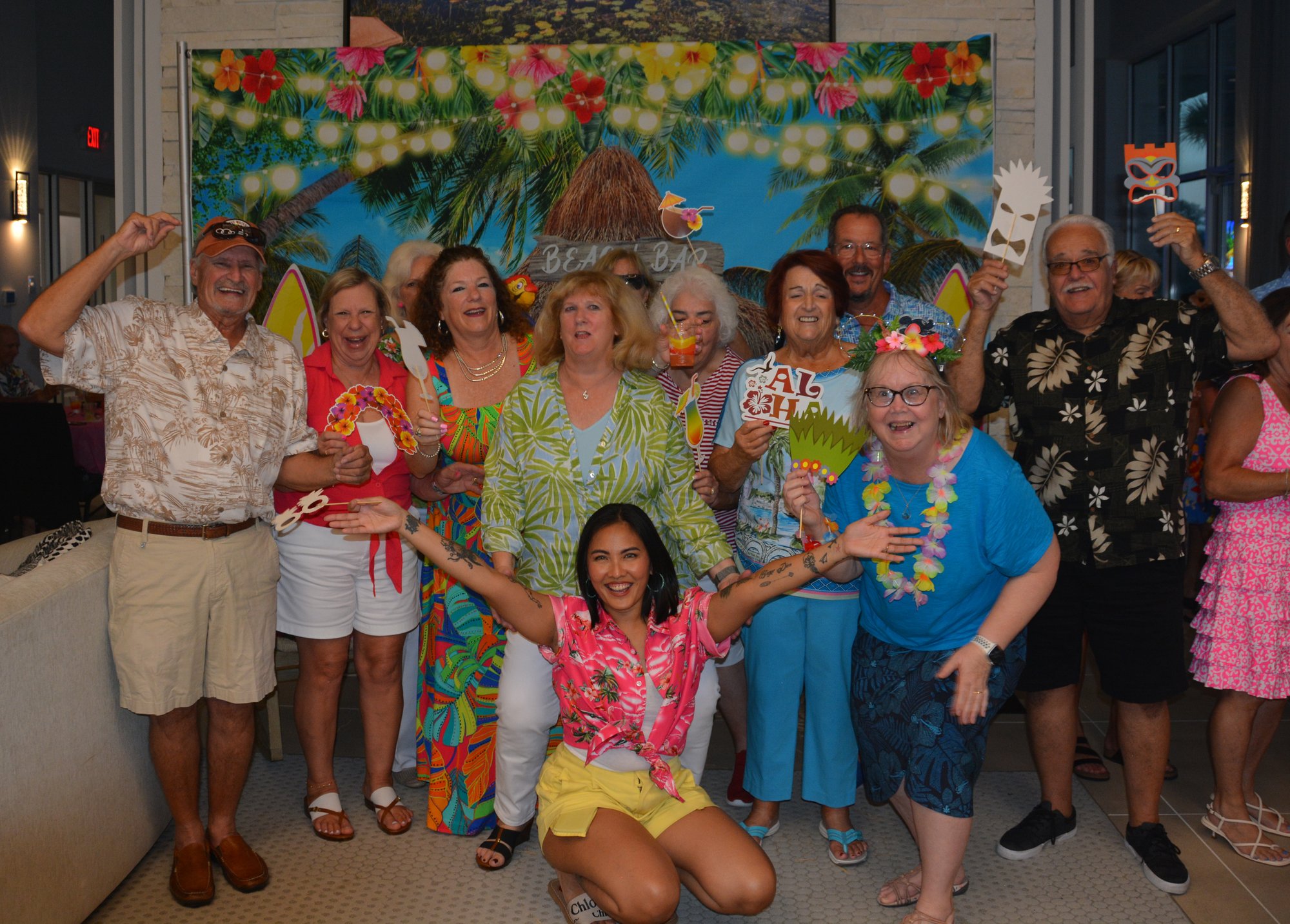Community Manager hosting a fun Tiki party with residents in the neighborhood.